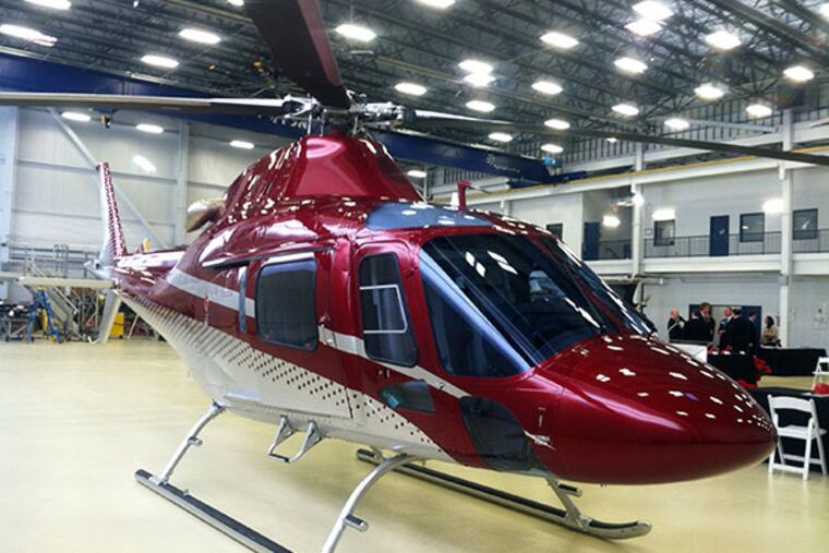 Government and manufacturers gathered at the AgustaWestland helicopter plant in Philadelphia for the initial report of Mayor Nutter's Manufacturing Task Force on December 19, 2013. (Jane M. Von Bergen/Staff)