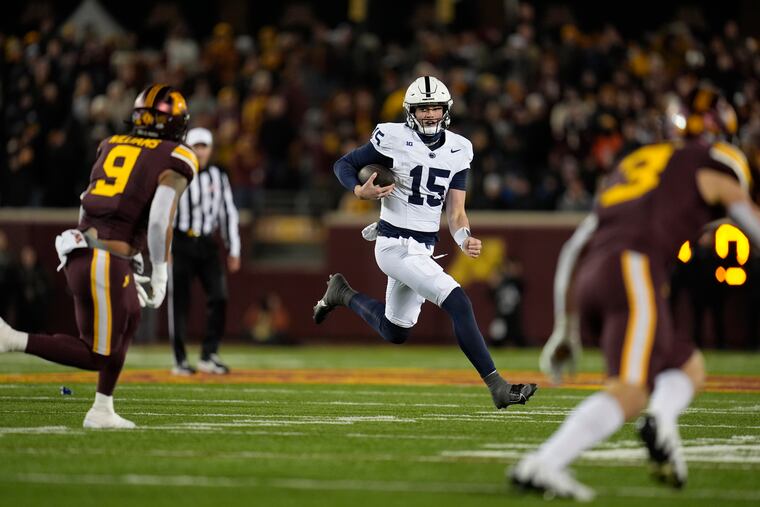 Penn State quarterback Drew Allar runs with the ball during the second half against Minnesota.
