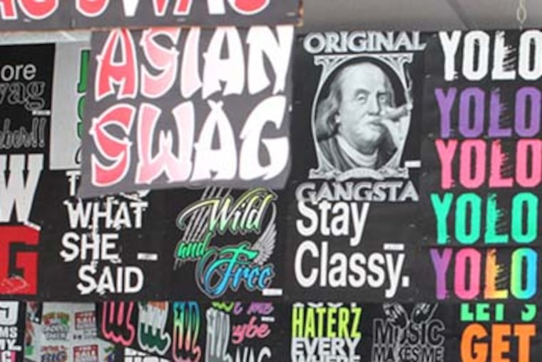 Images of T-shirts being sold on the Wildwood Boarwalk by several seasonal vendors displaying vulgar words and statements on Tuesday. (Photo: Tom Briglia)