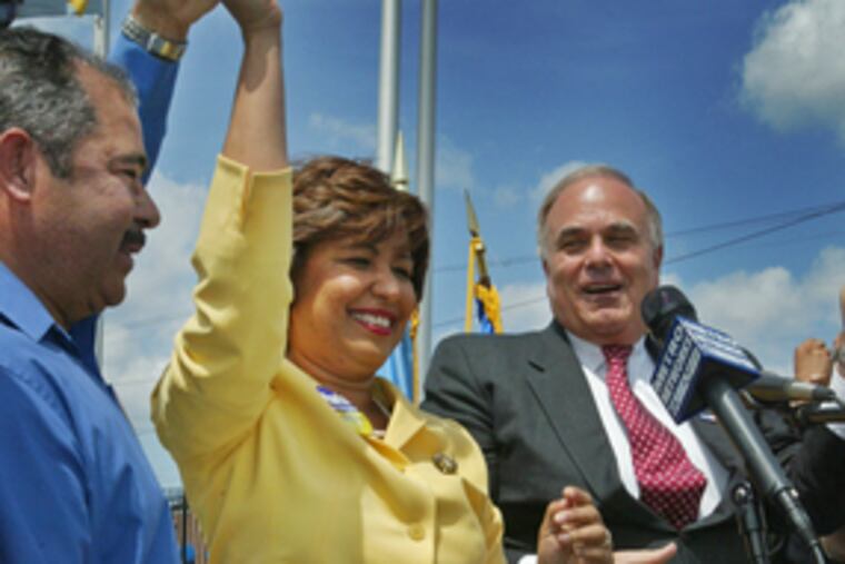 Maria Quinones Sanchez beams after being endorsed yesterday by Gov. Rendell (right) in her race for Council's 7th District seat.
