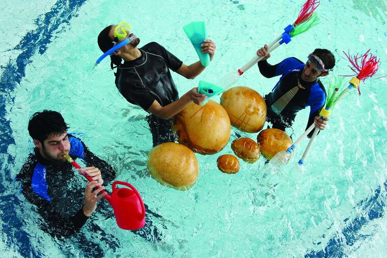Water works: French ensemble Aquacoustique perform "Concerto in Sea Major" in fountains across the city as part of the PIFA fest.