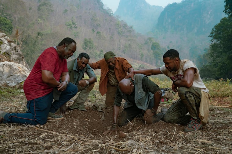 From Left, Isiah Whitlock Jr., Norm Lewis, Clarke Peters, Delroy Lindo and Jonathan Majors in "Da 5 Bloods." (David Lee/Netflix)