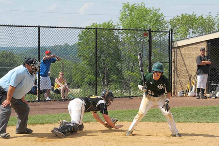 Bonner's Jim Murphy is hit by a pitch with bases loaded in the 11th inning to force in winning run.