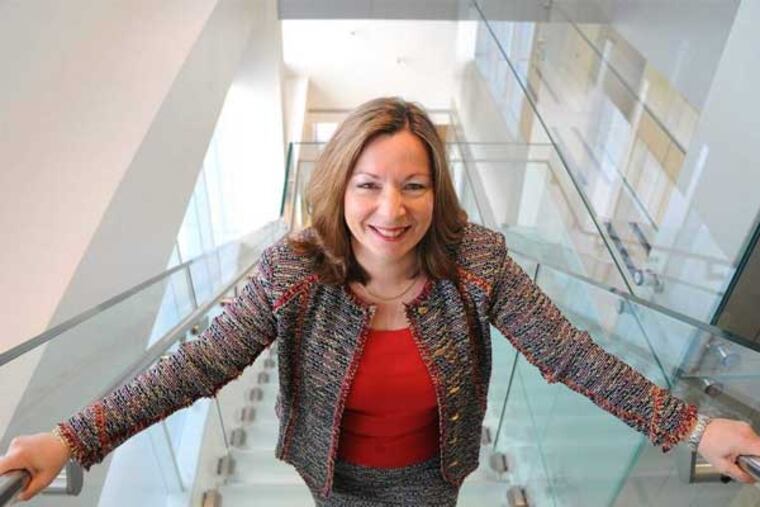 Cathy Avgiris, a Comcast executive vice president, has been promoted to chief financial officer of its cable division. (Clem Murray / Staff Photographer)