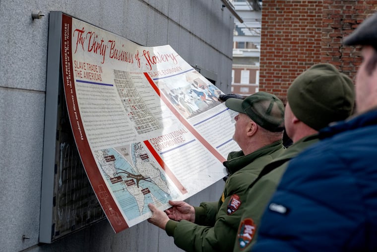Workers remove the display panels about slavery at the President’s House site in Independence National Historical Park Thursday, Jan. 22, 2026. The fate of exhibits at the site, which serves as a memorial to the nine people George Washington enslaved there during the founding of America, had been in limbo since President Trump’s executive order, “Restoring Truth and Sanity to American History," directed the Department of the Interior to review over 400 national sites to remove or modify interpretive materials that "inappropriately disparage Americans past or living.”