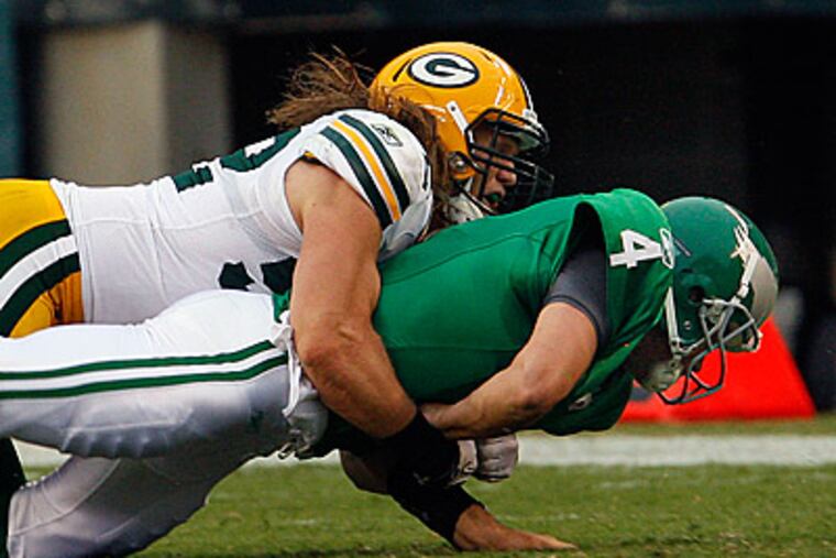 Kevin Kolb suffered a concussion in Week 1 on this hit by Packers linebacker Clay Matthews. (Ron Cortes/Staff Photograher)