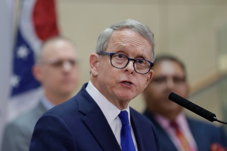 In this Feb. 27 photo, Ohio Gov. Mike DeWine gives an update at MetroHealth Medical Center in Cleveland on the state's preparedness and education efforts to limit the spread of coronavirus.