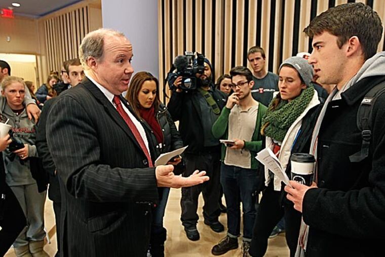 Larry Dougherty (left) seen here in 2018, announced his retirement from Temple's sports information office on Wednesday, putting a pin in a 38-year career in college athletics.