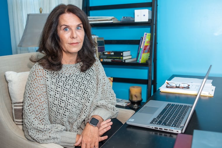 Pennsbury School Board President Christine Toy-Dragoni at in her home office in Yardley. Toy-Dragoni is among the school board members nationally who have reported threats amid backlash over masking and diversity, equity and inclusion efforts.