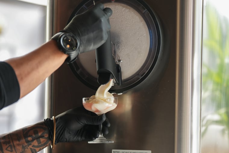 A soft serve margarita unfurls out of a Carpigiani V Air Smart slushie machine at Attico. The rooftop bar makes their version by added flavor syrups to their in-house tequila-infused ice cream.