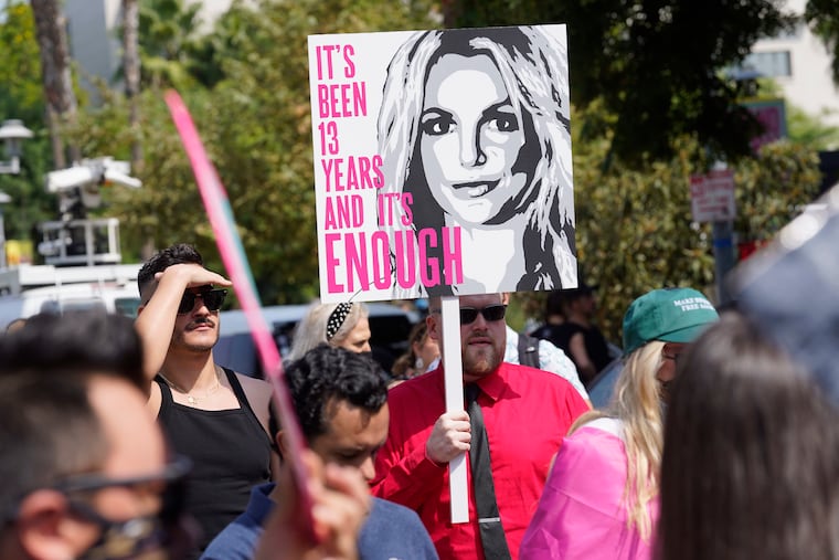 Britney Spears supporters demonstrate outside the Stanley Mosk Courthouse on Wednesday in Los Angeles. A Los Angeles judge removed Spears' father from the conservatorship that controls her life and money.