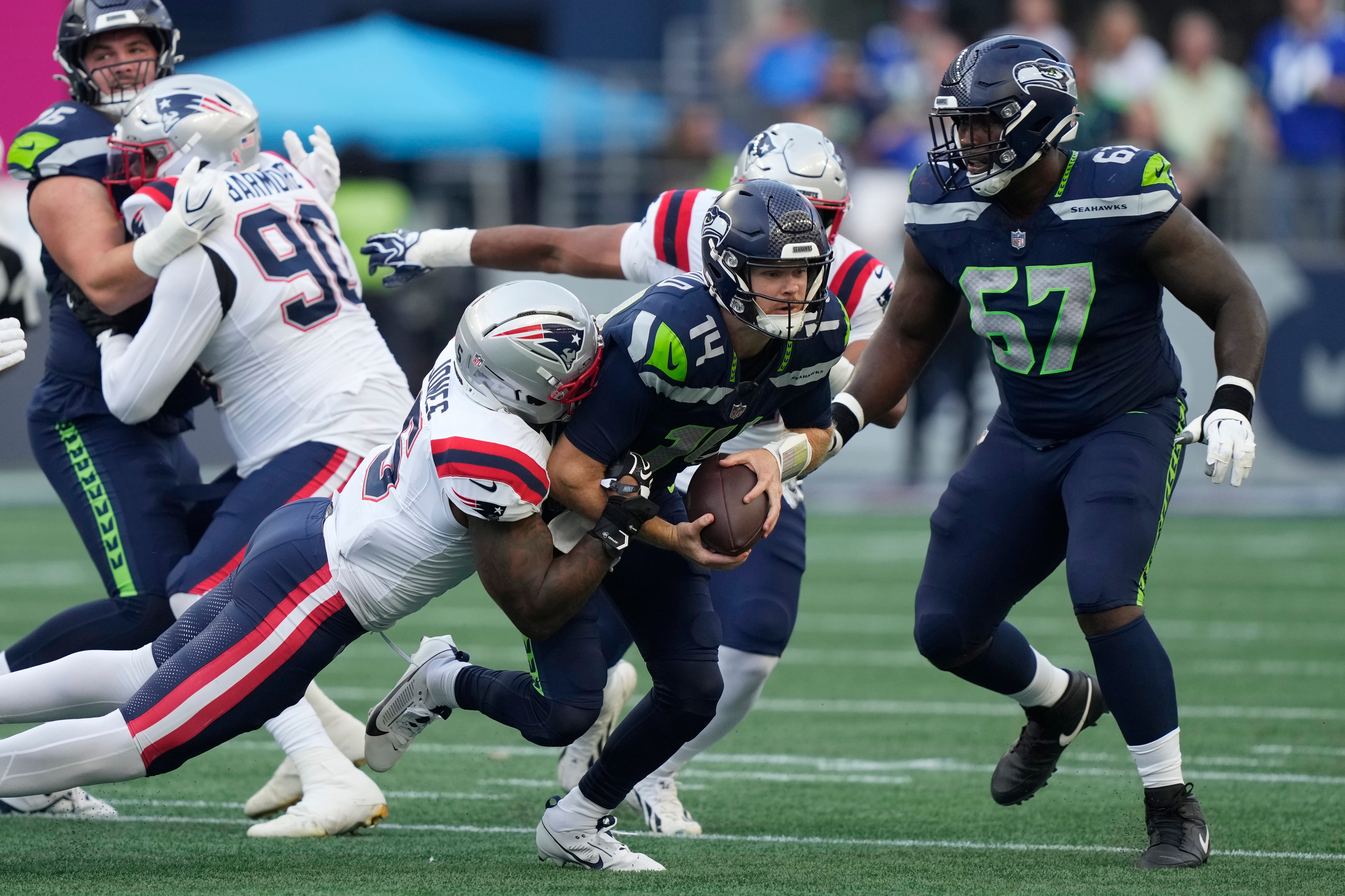 Sam Darnold injures hip on Seahawks' first series of opener and is ruled out for rest of game