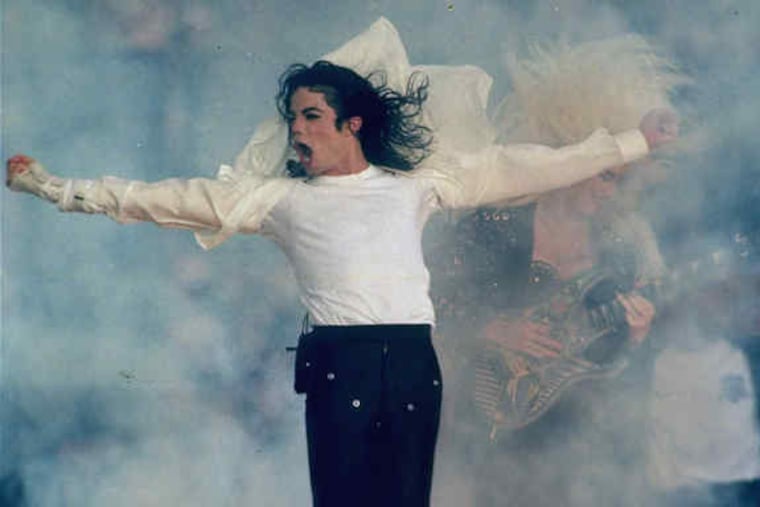 Michael Jackson appeared in a cloud of smoke in the halftime show at Super Bowl XXVII in Pasadena, Calif., in 1993. The 12-minute spectacular featured 3,500 children when he sang "Heal the World," the Jackson song that is also the name of his international children's aid foundation.
