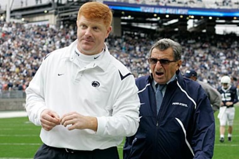 Penn State assistant football coach Mike McQueary will not attend Saturday's game against Nebraska. (Carolyn Kaster/AP)