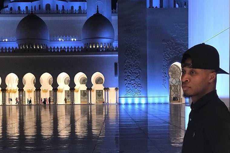 The author, outside the Sheikh Zayed Grand Mosque in Abu Dhabi, United Arab Emirates, says that despite the war, he feels a level of day-to-day safety that he didn’t always feel growing up.
