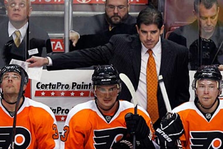 Peter Laviolette and the Flyers have won four straight games. (Yong Kim/Staff Photographer)