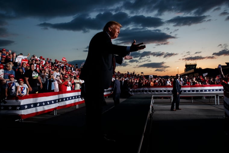 President Donald Trump reacts to the crowd after speaking to a campaign rally in Montoursville, Pa.