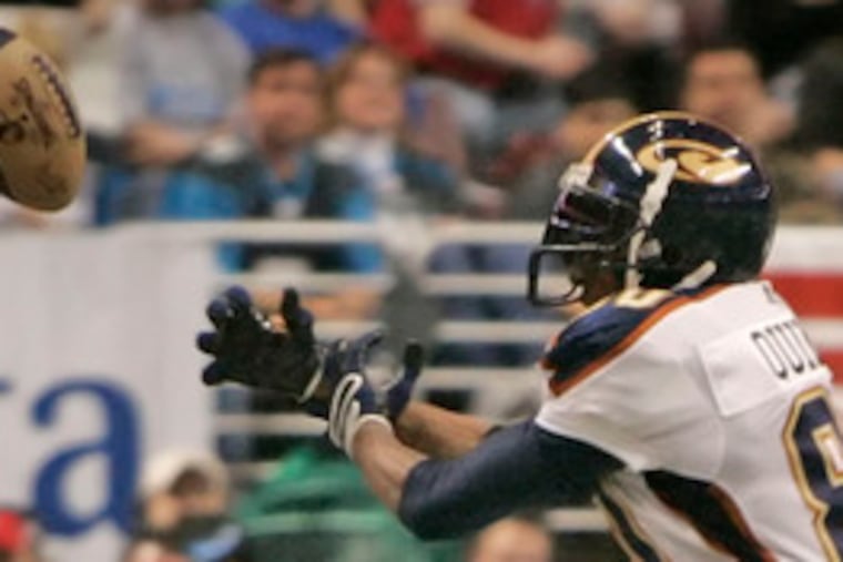 Another Colorado pass eludes the Crush's Willie Quinnie. Tied at 27 at the half, the Soul exploded for 44 second-half points in the win.