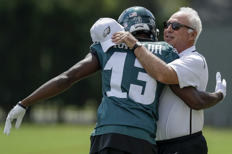 Eagles Chairman and Chief Executive Officer Jeffrey Lurie with wide receiver Nelson Agholor during team practice at the NovaCare Complex on Thursday.
