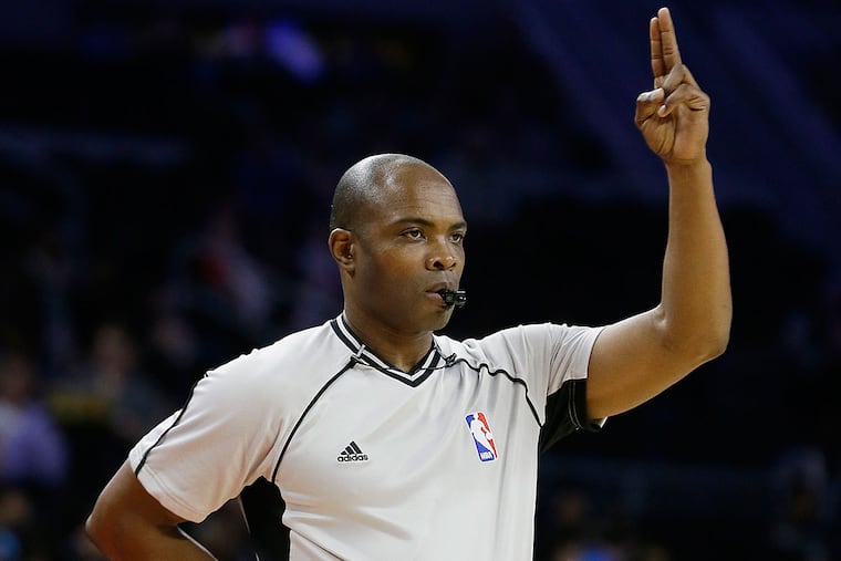 Referee Courtney Kirkland signals during the first half of an NBA basketball game between the Detroit Pistons and the Philadelphia 76ers, Wednesday, Feb. 24, 2016, in Auburn Hills, Mich.