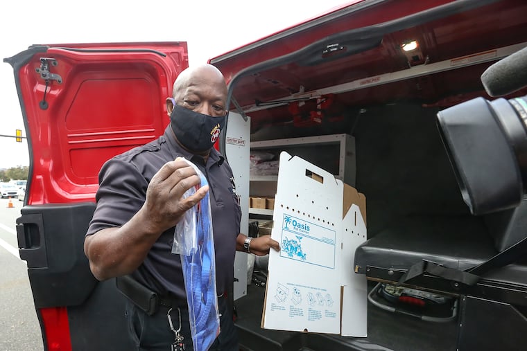 Community Action Team or "CAT-1" Lt. Kenneth Legions shows some the supplies the unit has like leashes and pet carriers. The Fire Department, Office of Emergency Management and Red Paw announced transition plans regarding pet-related emergency response services.