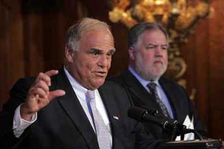 Pennsylvania Governor Ed Rendell talks to reporters about the state budget last week. The budget includes the largest increase in basic education funding since 1991. (Laurence Kesterson / Inquirer)