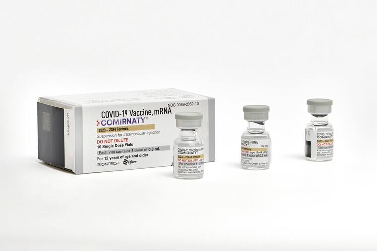 This photo provided by Pfizer in September 2023 shows single-dose vials of the company's updated COVID-19 vaccine for adults.