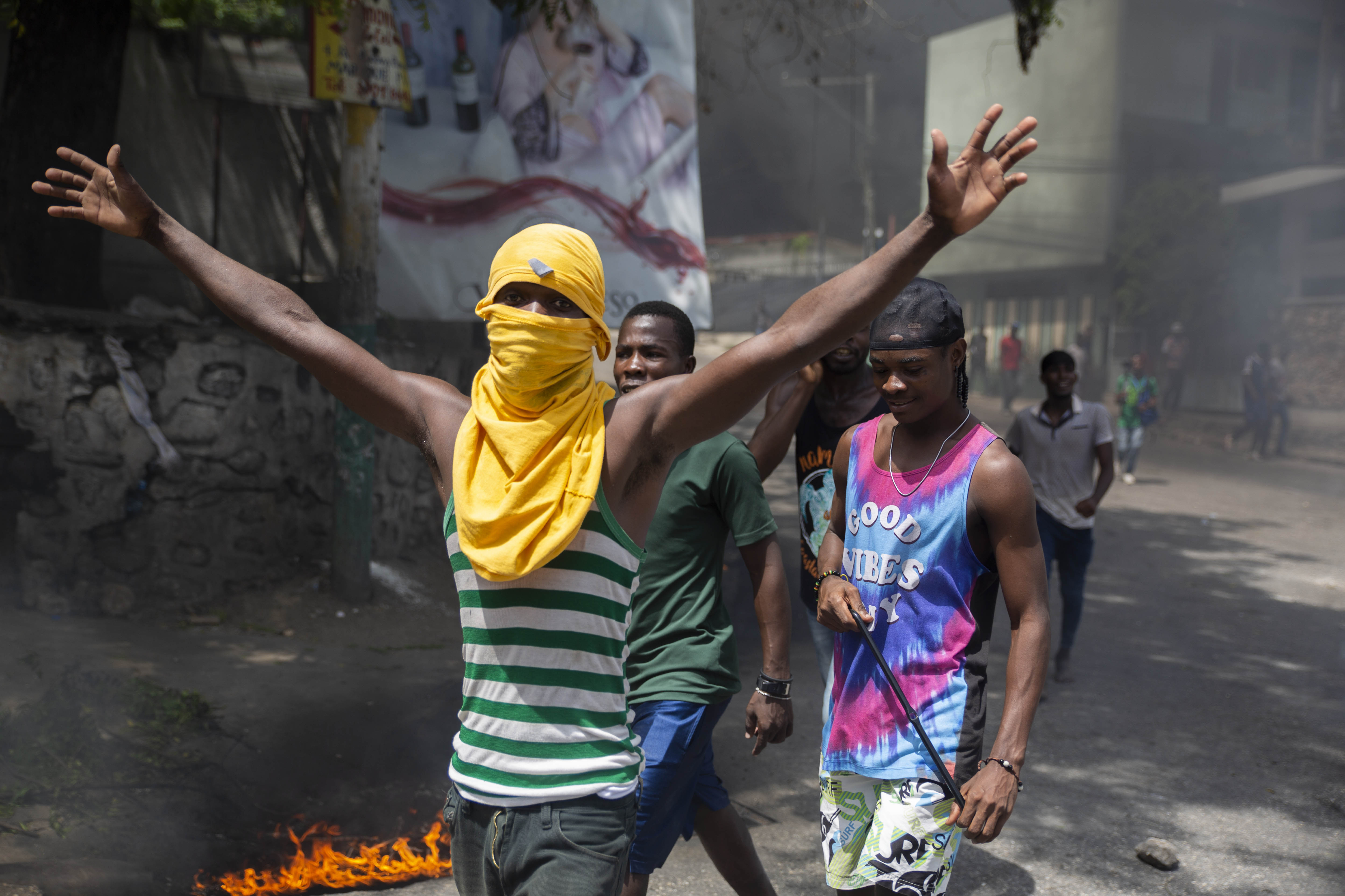 People protest after the assassination of Haitian President Jovenel Moïse near the police station of Petion Ville in Port-au-Prince on Thursday.