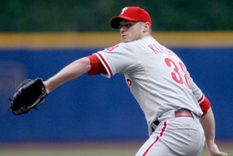 Philadelphia Phillies' Kyle Kendrick pitches to the Milwaukee Brewers during the first inning of a baseball game Saturday, Sept. 26, 2009, in Milwaukee. (AP Photo/Darren Hauck)