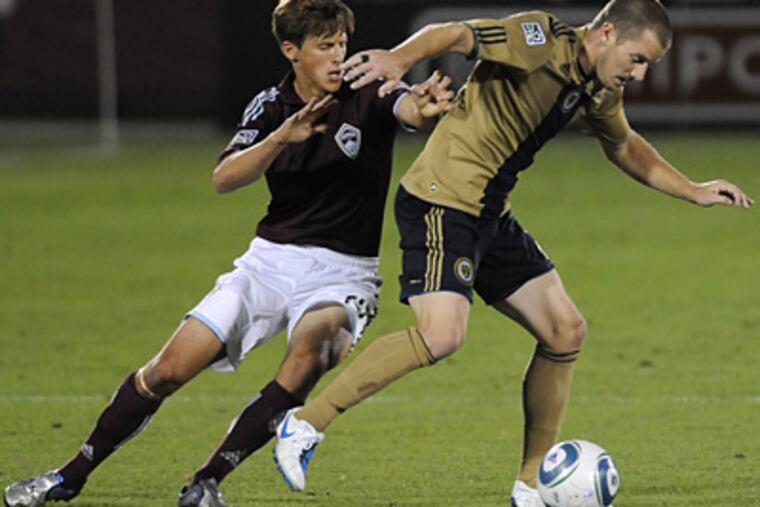 Midfielder Wells Thompson, left, and the Rapids will face FC Dallas in the MLS Cup. (AP Photo/Matt McClain)