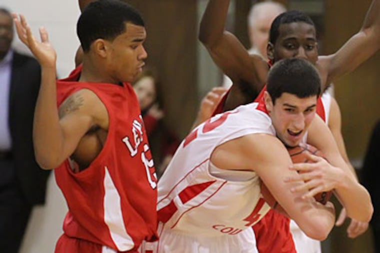 Cherry Hill East senior Jake Gurkin, right, recorded the first triple-double of his career against Lenape. (Michael Bryant/Staff Photographer)