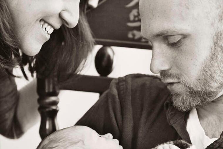 Abby Perkiss and Brent Freedland with Zoe.