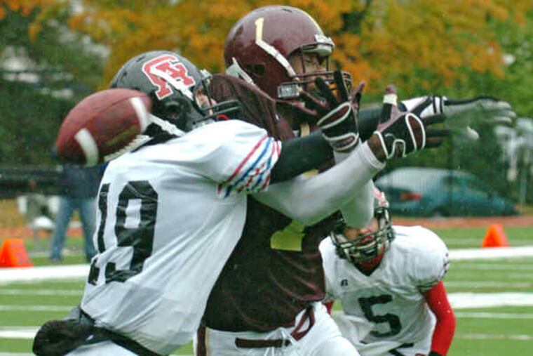 Germantown Academy's Austin Kevitch breaks up a pass intended for Haverford School's AJ Kaikai-Jones.