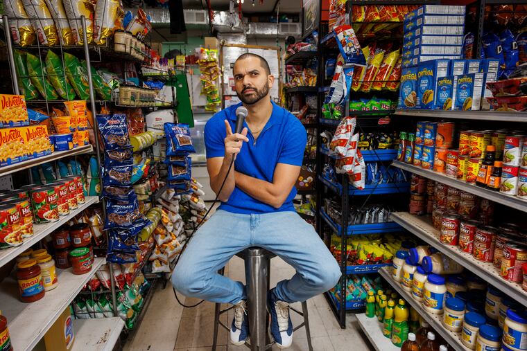 Che Guerrero, a Philadelphia comedian, came to this country as a child from the Dominican Republic. He's pictured here at a Dominican-owned neighborhood grocery not far from his home in South Philadelphia. His routine shines a light on his life as an undocumented person and on the lives of others who live without official permission to be in the U.S. This picture was taken on Friday, Dec. 20, 2024.