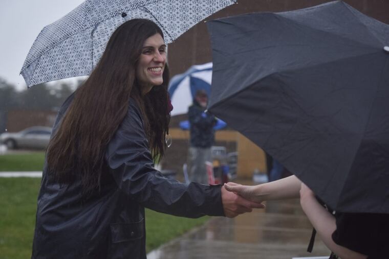 Danica Roem, who is running for house of delegates against GOP incumbent Robert Marshall, campaigns as voters take to the ballot boxes at Gainesville Middle School on Tuesday, November 7, 2017, in Gainesville, VA.