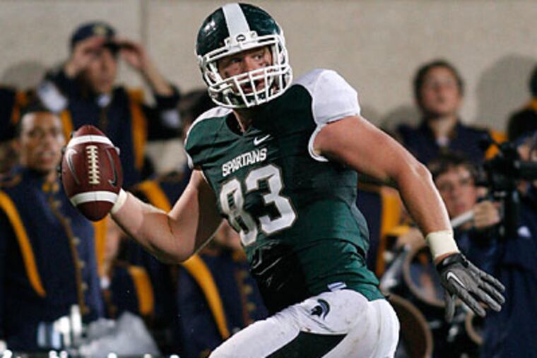 Michigan State beat Notre Dame with a fake field goal that turned into a touchdown pass to Charlie Gantt (above). (Al Goldis/AP)
