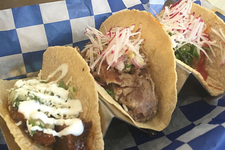 Classic tacos from Jose Garces' Buena Onda. (CRAIG LaBAN / Staff)