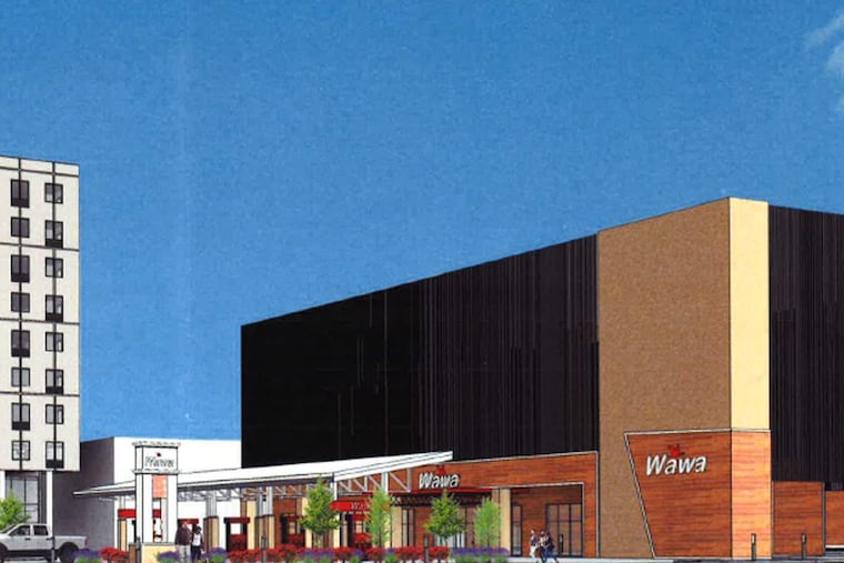 This is a preliminary rendering of the Wawa and 350-car parking garage that Michael Grasso's Metro Development wants to build on Spring Garden Street, just a block from the Delaware River.