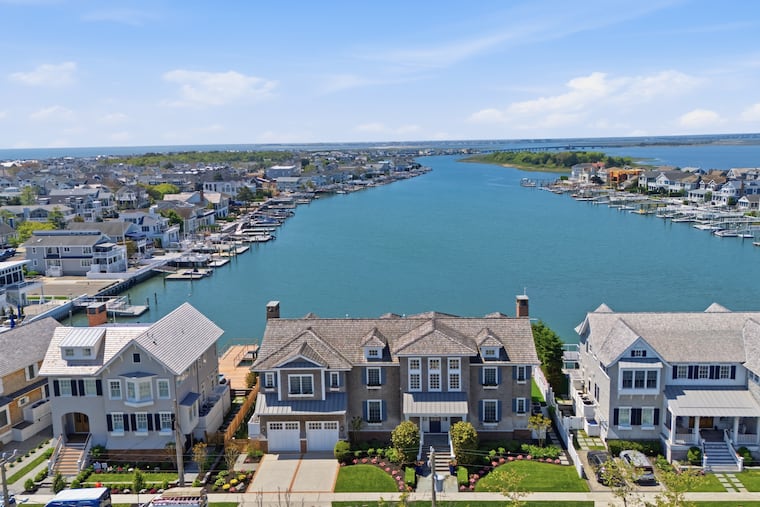 A $14.95 million home (center) is for sale on Stone Harbor's Carnival Bay, as is the $11.7 million property to the left.