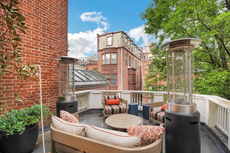 The second-floor library opens onto a terrace.