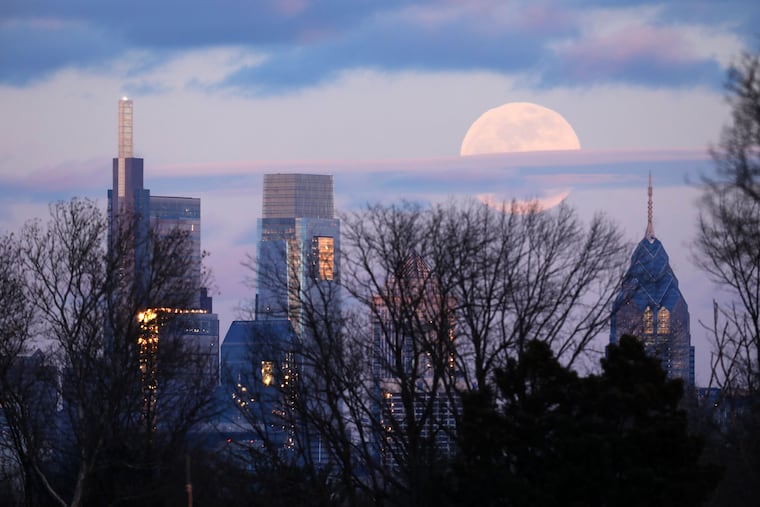 A supermoon rises above Philadelphia in January 2019.