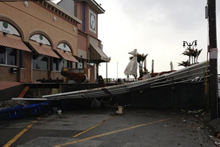 Storm damage near the A.C. Boardwalk this morning. (Aubrey Whelan/Staff)