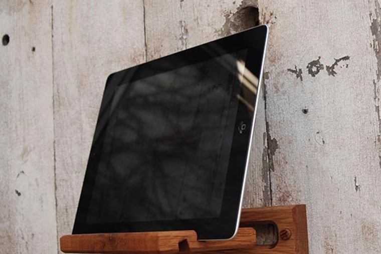 An iPad easel by Peg and Awl that can be used as desktop base or wall mount. $60. (Peg and Awl photo)