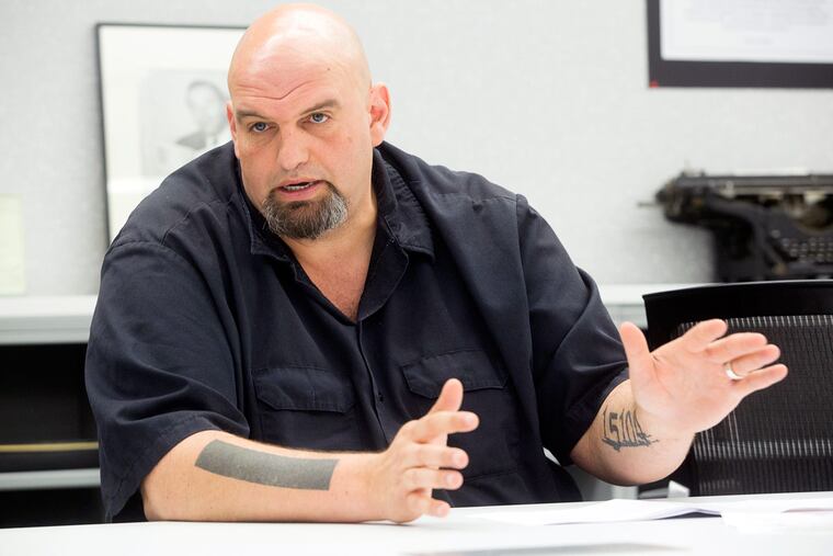 John Fetterman’s tattoos include “15104,” the zip code of Braddock, Pa., where he has been mayor for 10 years.