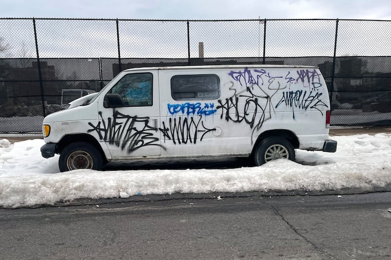 What came first? The dirty snowpacked berm of frozen slush or the graffiti?