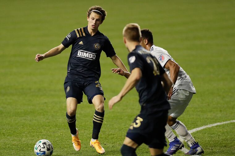 Union midfielder Brenden Aaronson, left, surprisingly made the MLS team of the season.