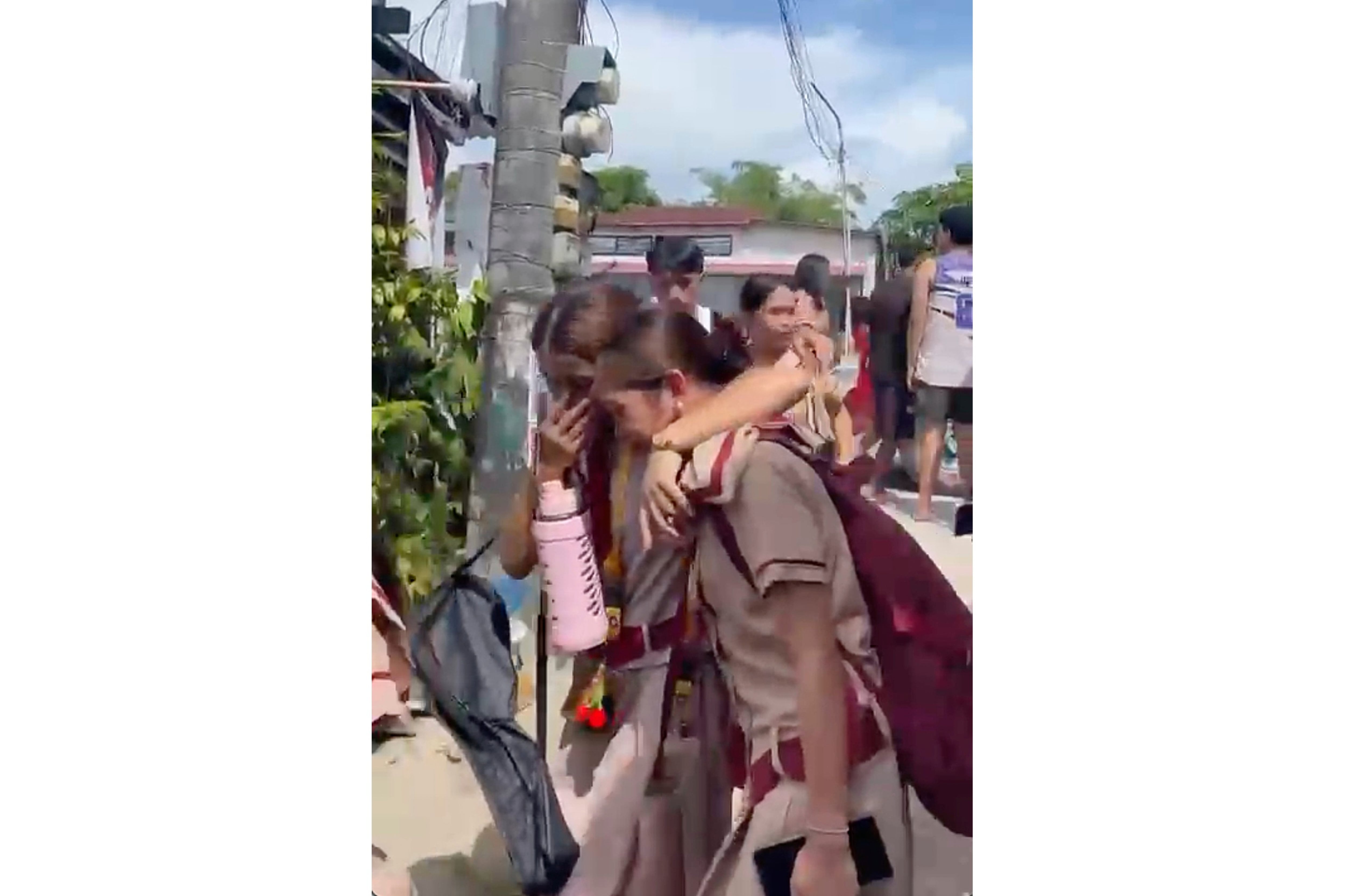 High school shooting in the Philippines kills 3, and police arrest 2 students