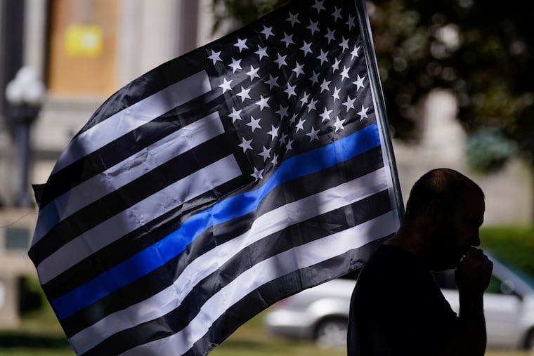 An August 2020 file photo of the "thin blue line" flag.