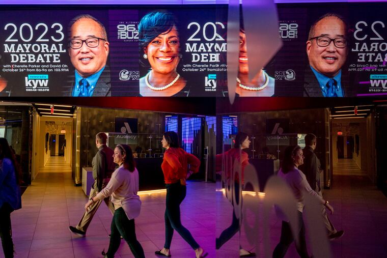 Images of Cherelle Parker and David Oh in the lobby of KYW Newsradio after the mayoral debate on Thursday. Oh missed his chance to make an impression, writes Helen Ubiñas.