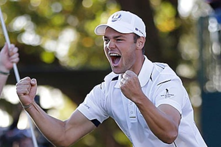 Europe's Martin Kaymer celebrates after winning the Ryder Cup. (David J. Phillip/AP)